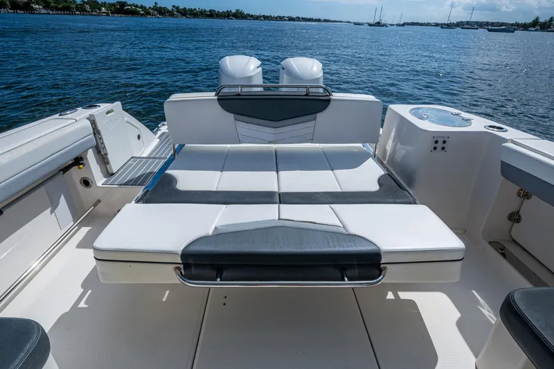  Yacht Photos Pics 2020 Robalo R317 Dual Console boat with spacious seating on open water.