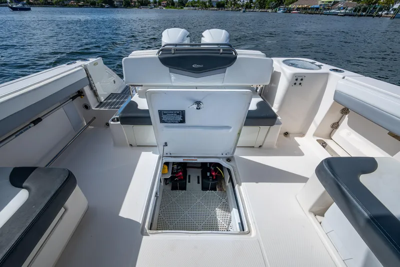  Yacht Photos Pics 2020 Robalo R317 Dual Console boat interior with open storage compartment.