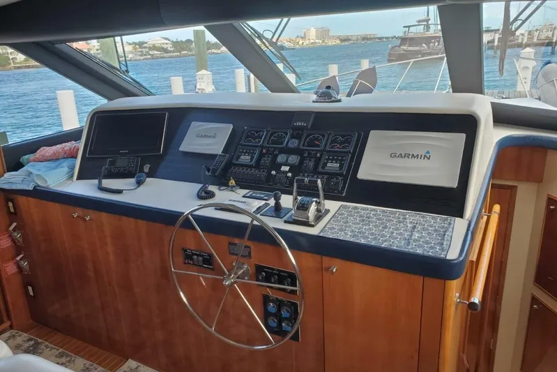 Island Dancer Yacht Photos Pics Helm of 2000 Hatteras 75 Sport Deck Motor Yacht with Garmin navigation system.