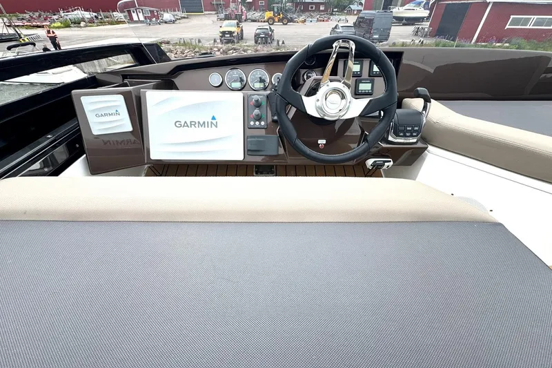  Yacht Photos Pics Cockpit of 2018 Galeon 470 Skydeck with Garmin navigation system and modern controls.