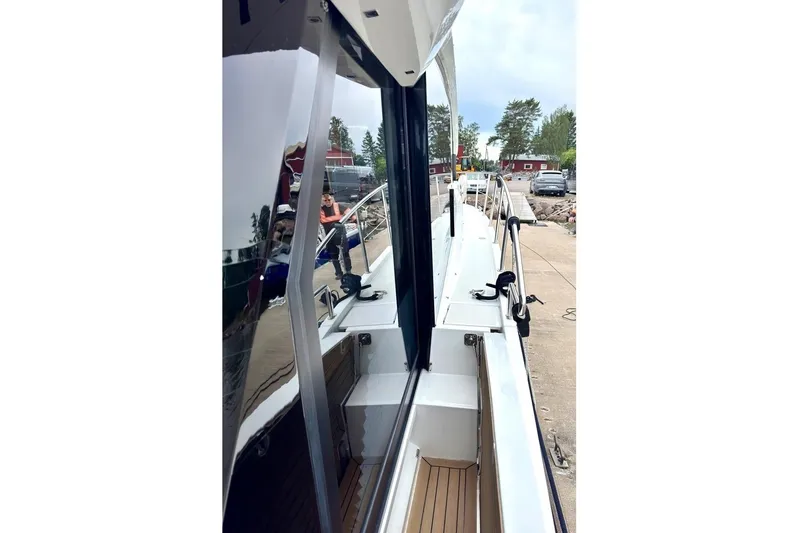  Yacht Photos Pics 2018 Galeon 470 Skydeck yacht docked, showcasing sleek design and polished exterior.