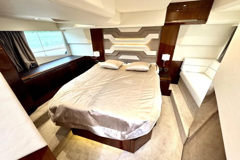  Yacht Photos Pics Luxurious bedroom interior of 2018 Galeon 470 Skydeck yacht with modern design.