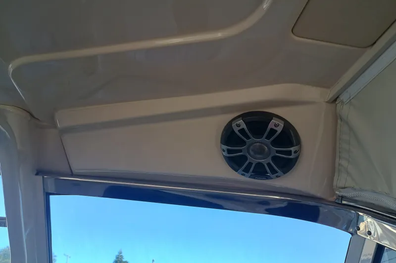 325-708 Brokerage Josh Yacht Photos Pics 2021 Grady-White Freedom 325 boat interior with mounted speaker.