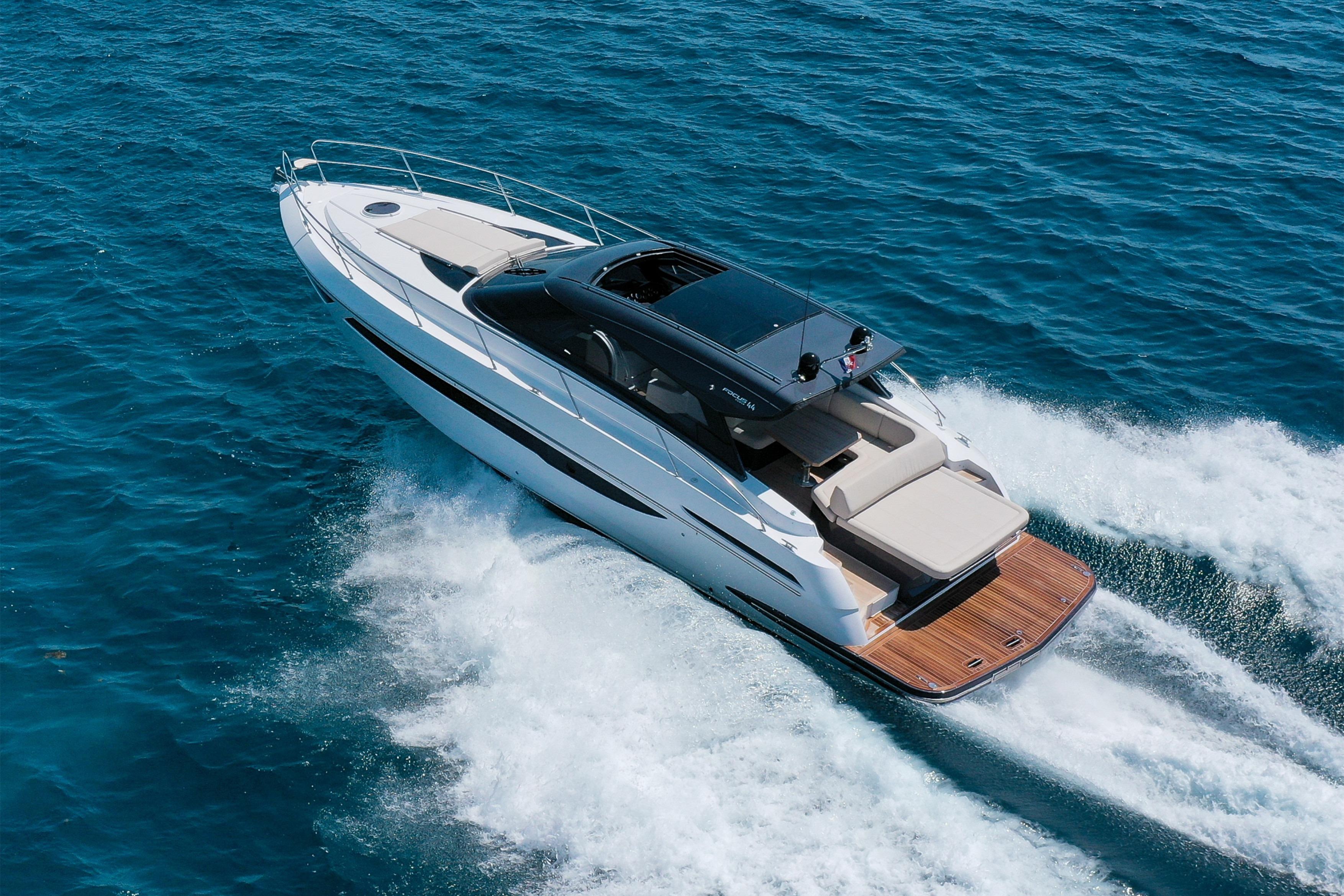 2023 Focus Power 44 yacht cruising on open blue sea.