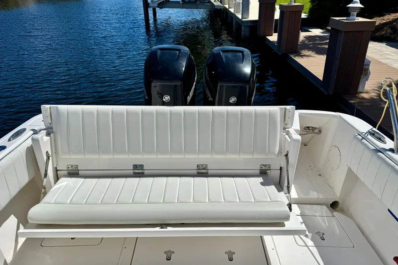  Yacht Photos Pics 2014 Intrepid 327 Center Console boat with white seating and dual outboard motors.