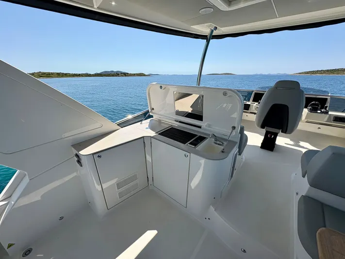  Yacht Photos Pics 2024 Absolute NAVETTA 52 yacht interior with sleek design and ocean view.