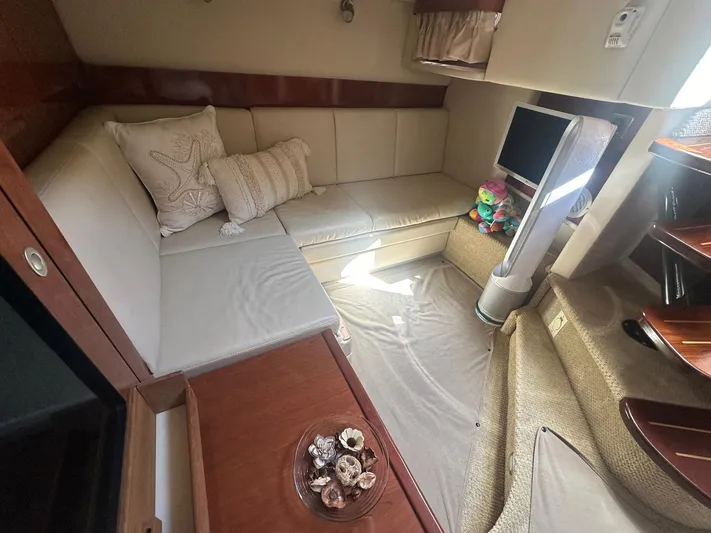 Salty Dawg Yacht Photos Pics Interior of 2006 Sea Ray 380 Sundancer with cozy seating and modern amenities.