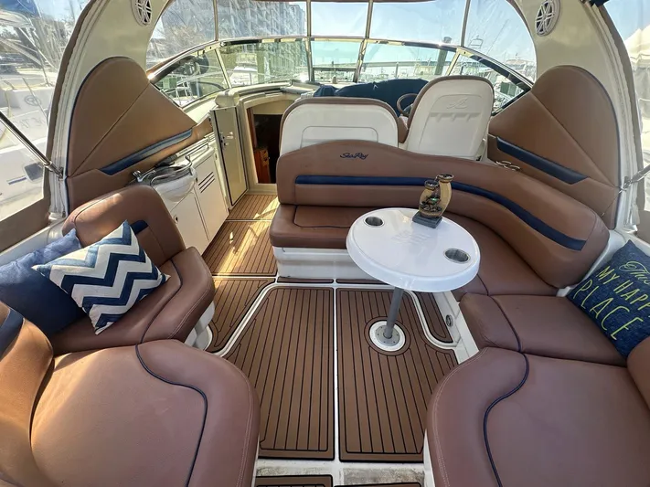Salty Dawg Yacht Photos Pics Luxurious 2006 Sea Ray 380 Sundancer interior with plush seating and elegant design.