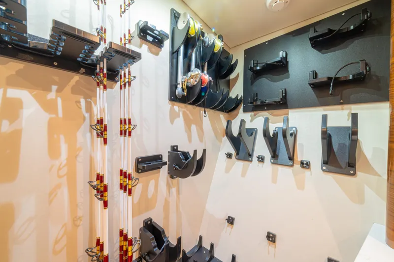  Yacht Photos Pics Storage area with fishing rod holders on a 2022 Jarrett Bay Flybridge Express.