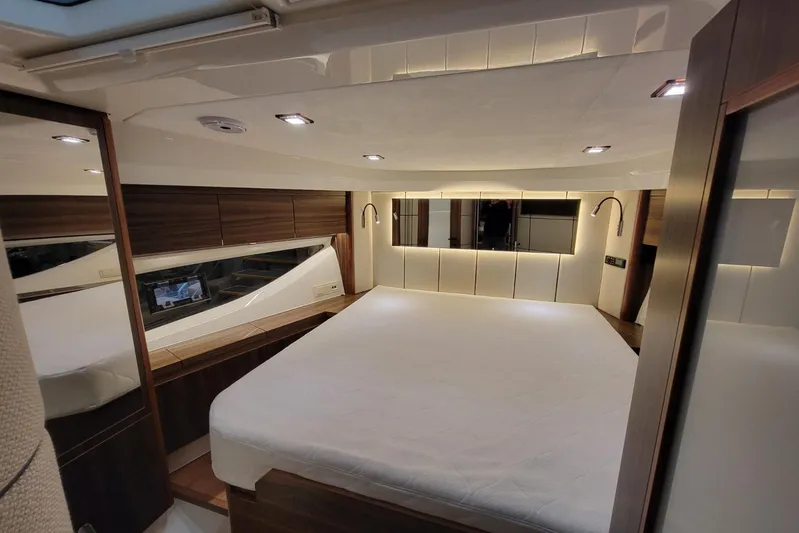 Soul Yacht Photos Pics Luxurious bedroom interior of 2025 Marex 440 Gourmet Cruiser yacht, featuring modern design.