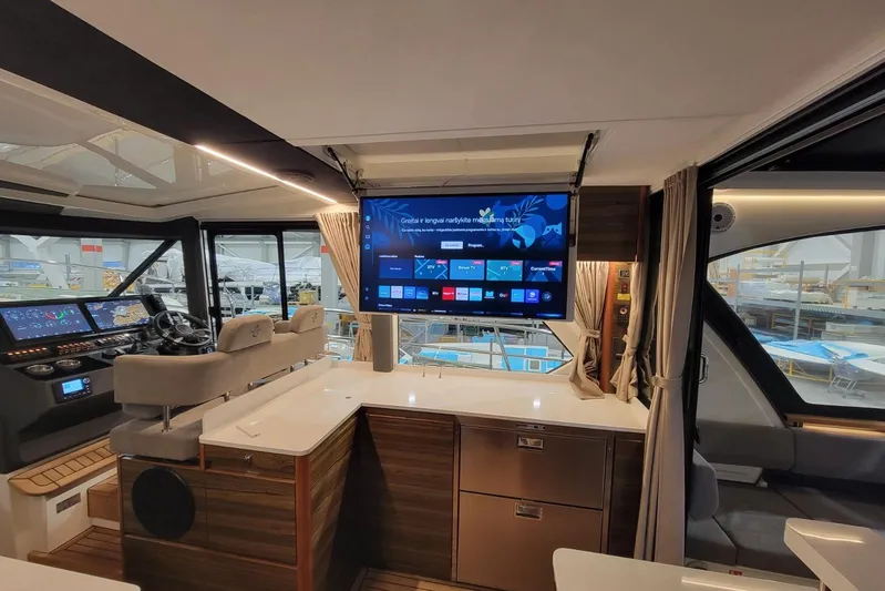 Soul Yacht Photos Pics Interior of 2025 Marex 440 Gourmet Cruiser with modern helm and entertainment system.