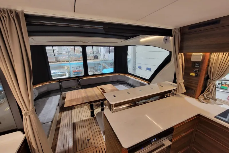 Soul Yacht Photos Pics Luxurious interior of 2025 Marex 440 Gourmet Cruiser with elegant seating and modern design.