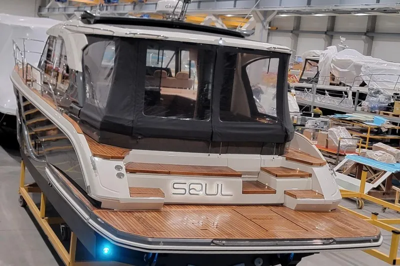 Soul Yacht Photos Pics 2025 Marex 440 Gourmet Cruiser in a workshop, showcasing elegant design and craftsmanship.