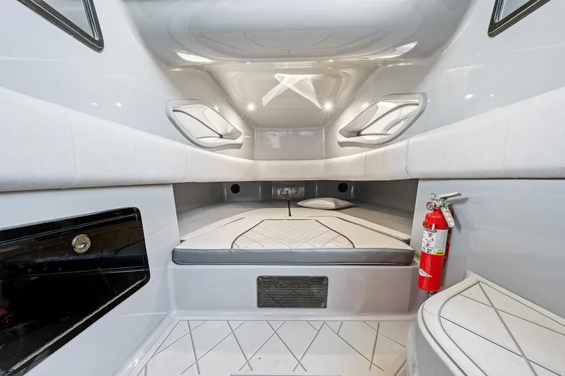  Yacht Photos Pics Interior cabin of 2025 Deep Impact 369 Sport boat, featuring modern design and safety equipment.