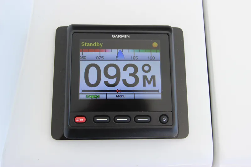  Yacht Photos Pics Garmin display on 2004 Hatteras 60 Convertible, showing heading 093M in standby mode.