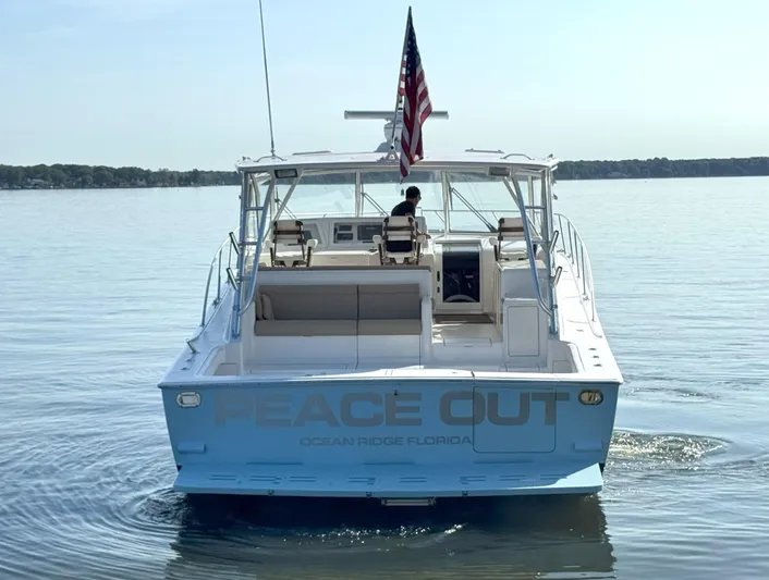 Peace Out Yacht Photos Pics 2007 Viking 52 Open yacht "Peace Out" on calm water, Ocean Ridge, Florida.