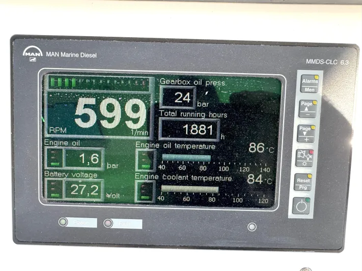 Peace Out Yacht Photos Pics MAN Marine Diesel engine display showing RPM, oil pressure, and temperatures on a 2007 Viking 52 Open.