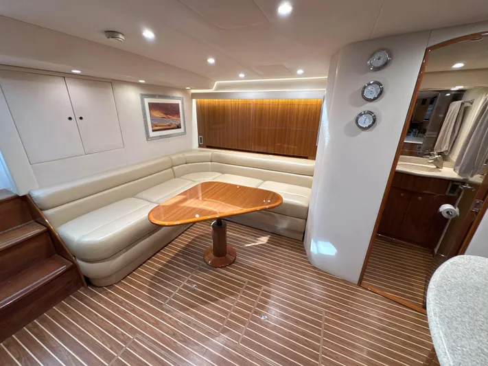 Peace Out Yacht Photos Pics Luxurious interior of 2007 Viking 52 Open yacht with elegant seating and wooden accents.