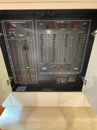 Peace Out Yacht Photos Pics Electrical panel of a 2007 Viking 52 Open boat, showcasing control switches and indicators.