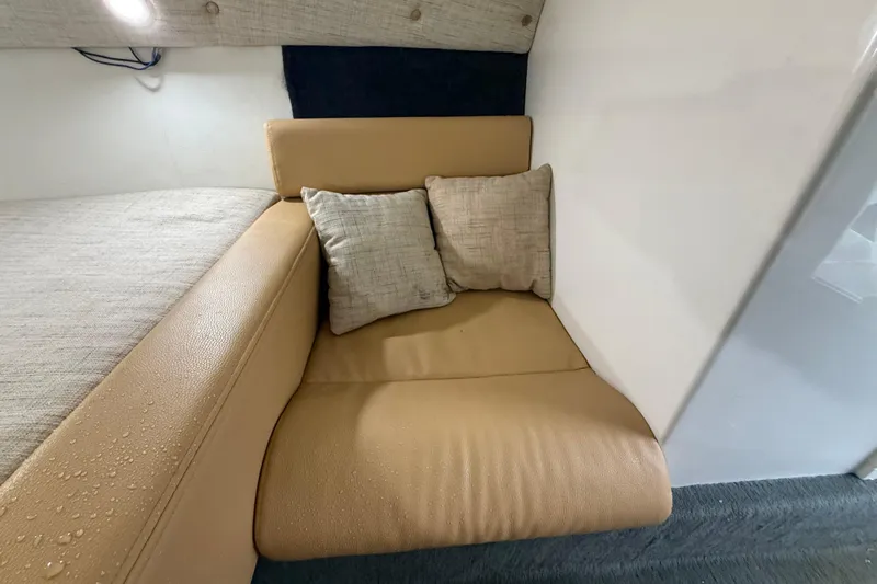  Yacht Photos Pics Cozy interior seating with cushions in 2021 Velocity 290sc boat cabin.