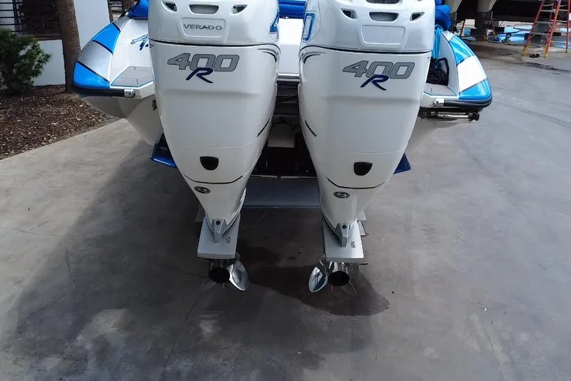  Yacht Photos Pics 2021 Velocity 290sc boat with dual 400R Verado outboard engines, rear view.