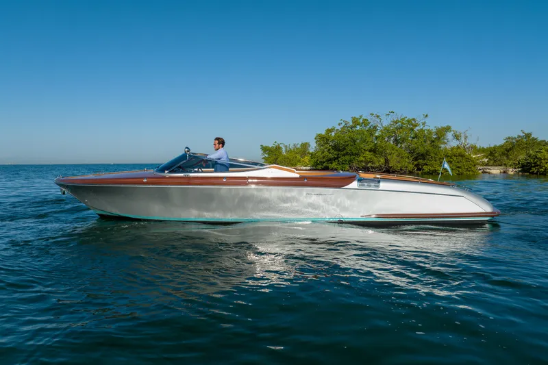 Mia Mia Yacht Photos Pics 2020 Riva Aquariva Super luxury motorboat cruising on a sunny day.