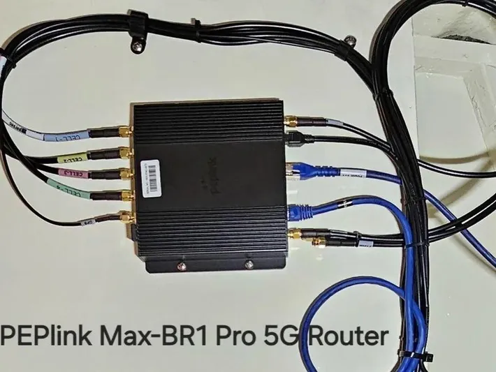 Carmella Yacht Photos Pics PEPlink Max-BR1 Pro 5G Router with multiple connected cables, Kadey-Krogen 44AE 2019.