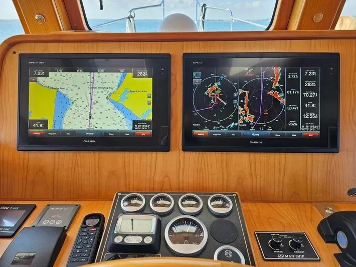 Carmella Yacht Photos Pics Kadey-Krogen 44AE 2019 yacht dashboard with navigation screens and control instruments.