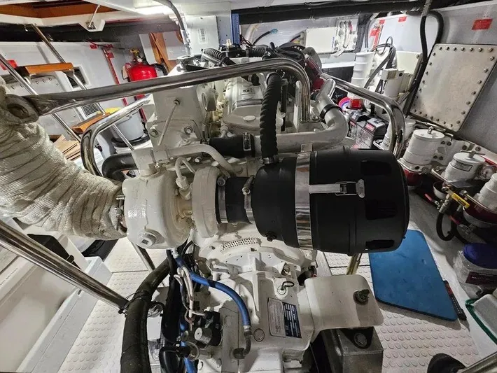 Carmella Yacht Photos Pics Engine room of 2019 Kadey-Krogen 44AE yacht, showcasing detailed machinery and components.