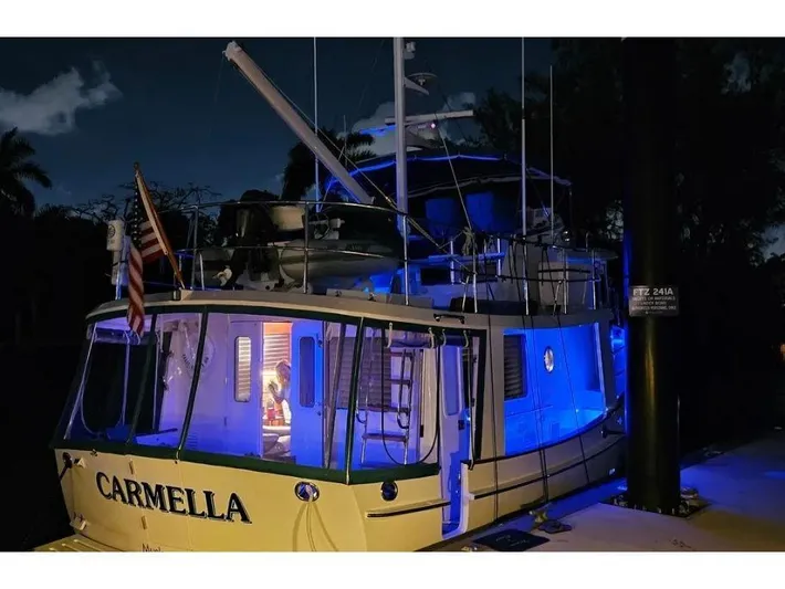 Carmella Yacht Photos Pics Kadey-Krogen 44AE 2019 yacht "Carmella" docked at night with blue lighting.
