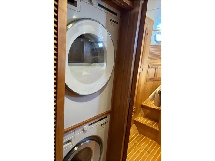 Carmella Yacht Photos Pics Stacked washer and dryer in 2019 Kadey-Krogen 44AE yacht interior.