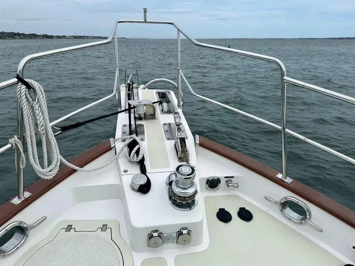 Carmella Yacht Photos Pics Bow of 2019 Kadey-Krogen 44AE yacht with railing and ocean view.