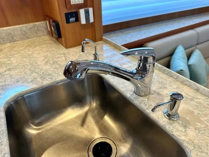 Carmella Yacht Photos Pics Modern kitchen sink and faucet in 2019 Kadey-Krogen 44AE yacht interior.