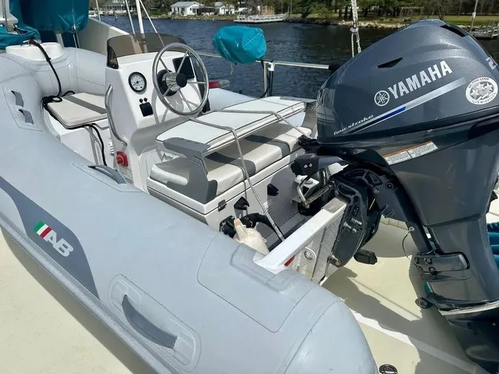 Carmella Yacht Photos Pics Inflatable boat with Yamaha motor on Kadey-Krogen 44AE, 2019 model, docked by a river.