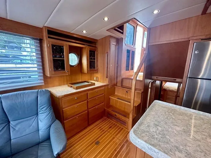 Carmella Yacht Photos Pics Luxurious 2019 Kadey-Krogen 44AE yacht interior with wood cabinetry and modern amenities.