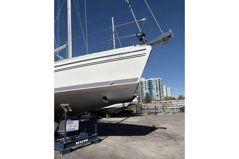 Sea Fever IV Yacht Photos Pics Catalina 355 sailboat from 2022 on display, for sale, with urban background.