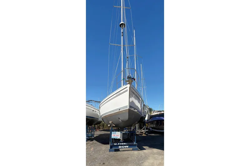 Sea Fever IV Yacht Photos Pics 2022 Catalina 355 sailboat on display, blue sky background.