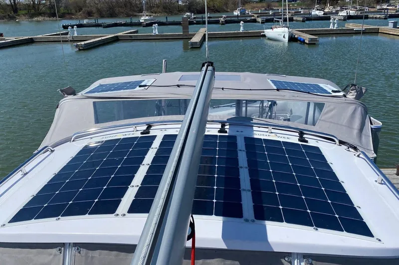 Sea Fever IV Yacht Photos Pics Catalina 355 sailboat with solar panels, docked in a marina, 2022 model.