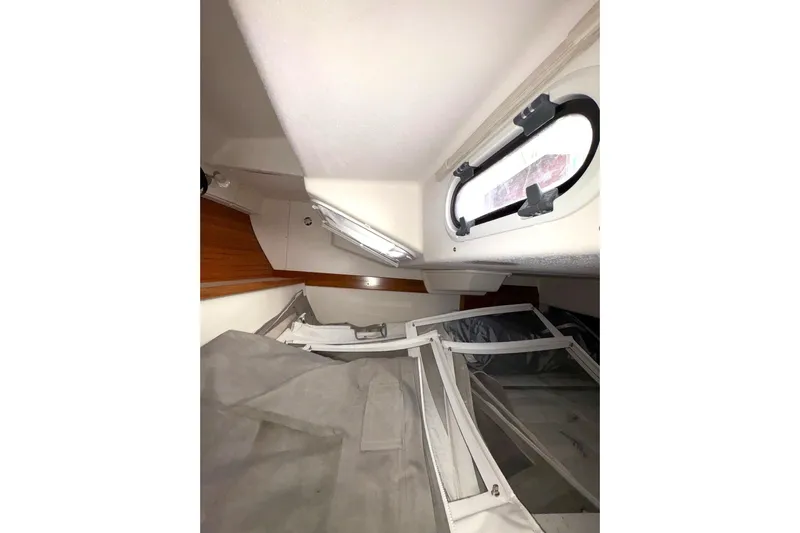 Sea Fever IV Yacht Photos Pics Interior cabin of 2022 Catalina 355 sailboat with window and storage area.