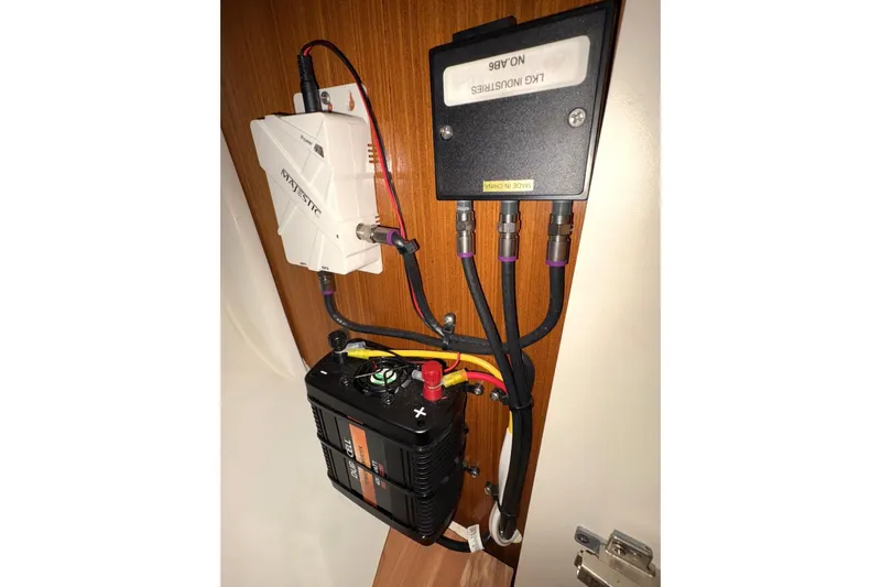 Sea Fever IV Yacht Photos Pics Electrical components inside a 2022 Catalina 355 yacht, featuring wiring and connectors.