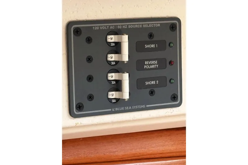 Sea Fever IV Yacht Photos Pics Electrical panel on a 2022 Catalina 355 boat, featuring shore power and polarity indicators.