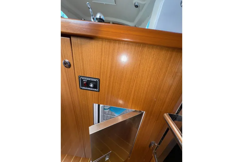 Sea Fever IV Yacht Photos Pics Interior of 2022 Catalina 355 yacht with wood paneling and LPG solenoid control.