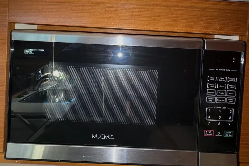 Sea Fever IV Yacht Photos Pics Built-in microwave oven in a Catalina 355 yacht, 2022 model.