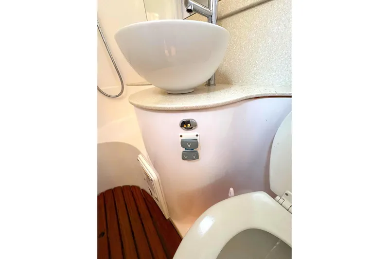 Sea Fever IV Yacht Photos Pics 2022 Catalina 355 yacht bathroom with modern sink and toilet design.