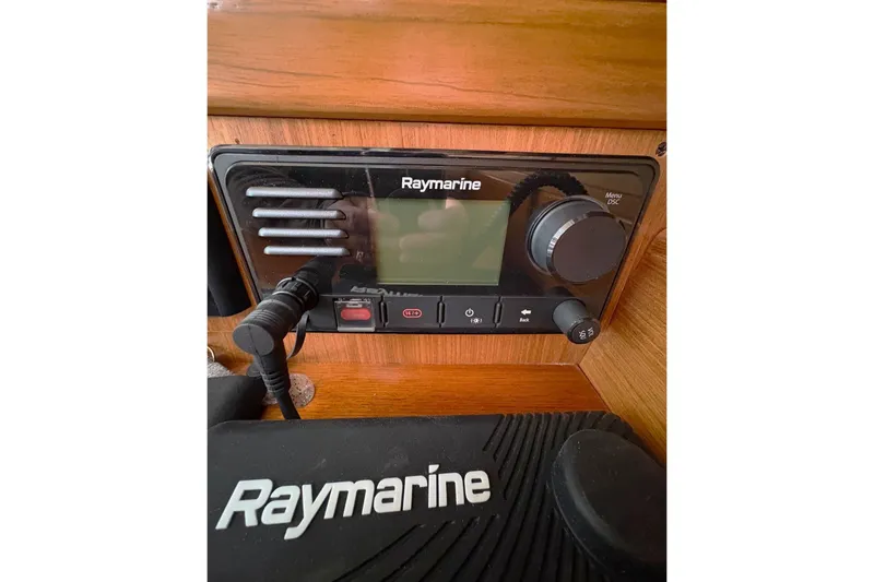 Sea Fever IV Yacht Photos Pics Raymarine marine radio on 2022 Catalina 355 yacht dashboard.