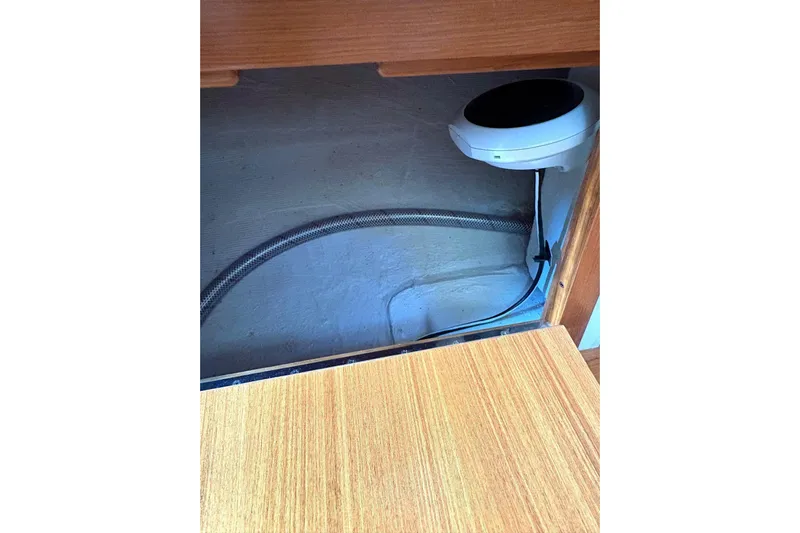 Sea Fever IV Yacht Photos Pics Interior view of a 2022 Catalina 355 sailboat, showcasing wiring and wood paneling.