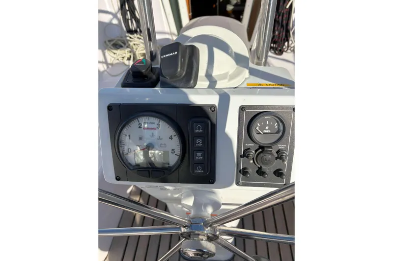 Sea Fever IV Yacht Photos Pics Control panel of a 2022 Catalina 355 sailboat, featuring gauges and switches.
