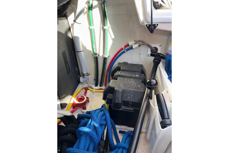 Sea Fever IV Yacht Photos Pics Interior view of a 2022 Catalina 355 sailboat showing ropes, cables, and equipment.