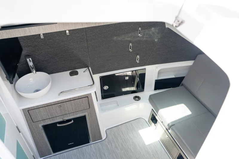  Yacht Photos Pics 2024 Blackfin 400CC cabin interior with modern amenities and sleek design.