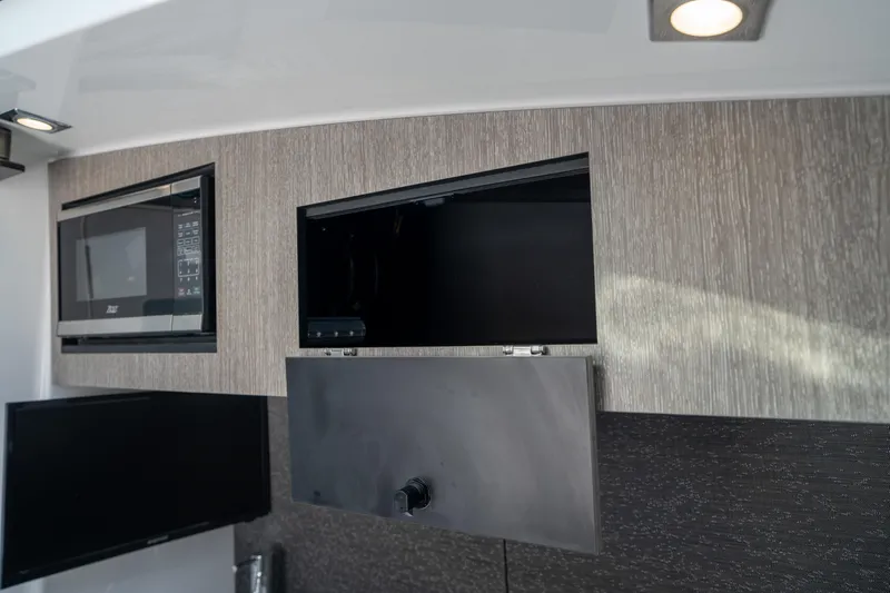  Yacht Photos Pics 2024 Blackfin 400CC interior with modern cabinetry and built-in appliances.